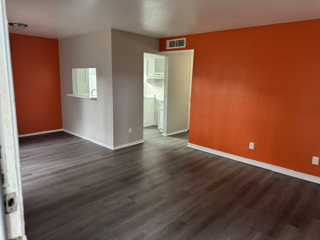 Updated model living room at Terraces at 2602 in Texas City