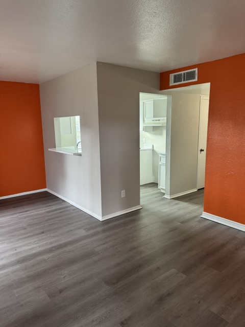 Updated model living and dining area at Terraces at 2602